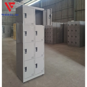 Iron locker cabinet with 8 individual compartments.